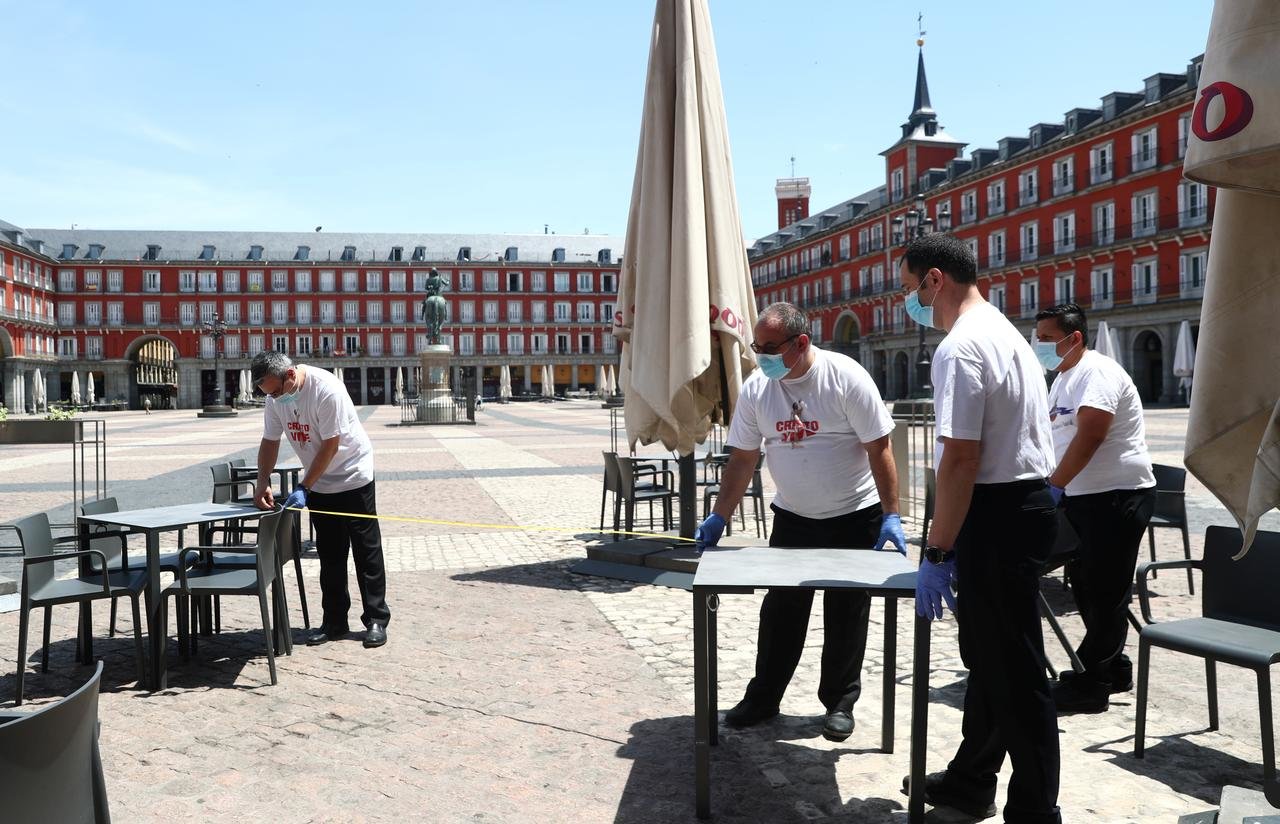 Madrid bars back in business – beaches open elsewhere in Spain