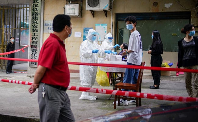 China Questions Coronavirus Origin To Wuhan Ahead Of WHO Probe