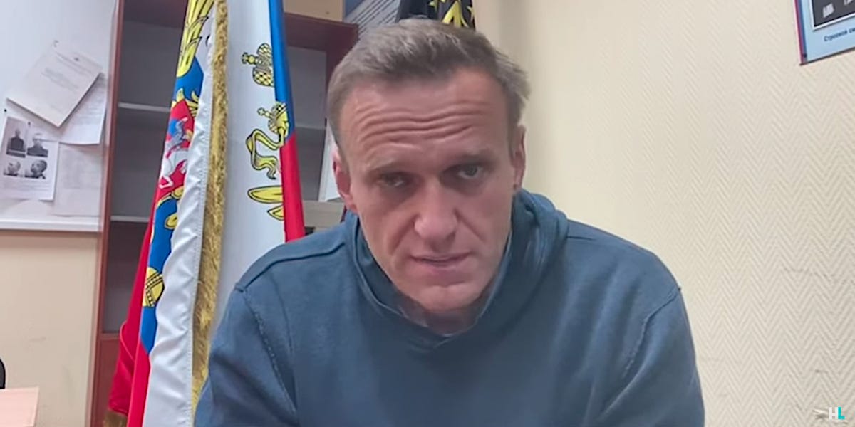 Putin critic Navalny sentenced to jail after being arrested at a Moscow airport on his way home after being poisoned