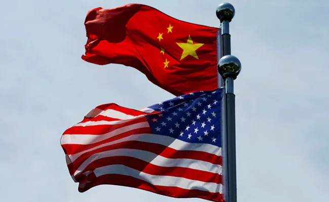 Two Chinese "Agents" Charged In US For Targeting Beijing Opponents