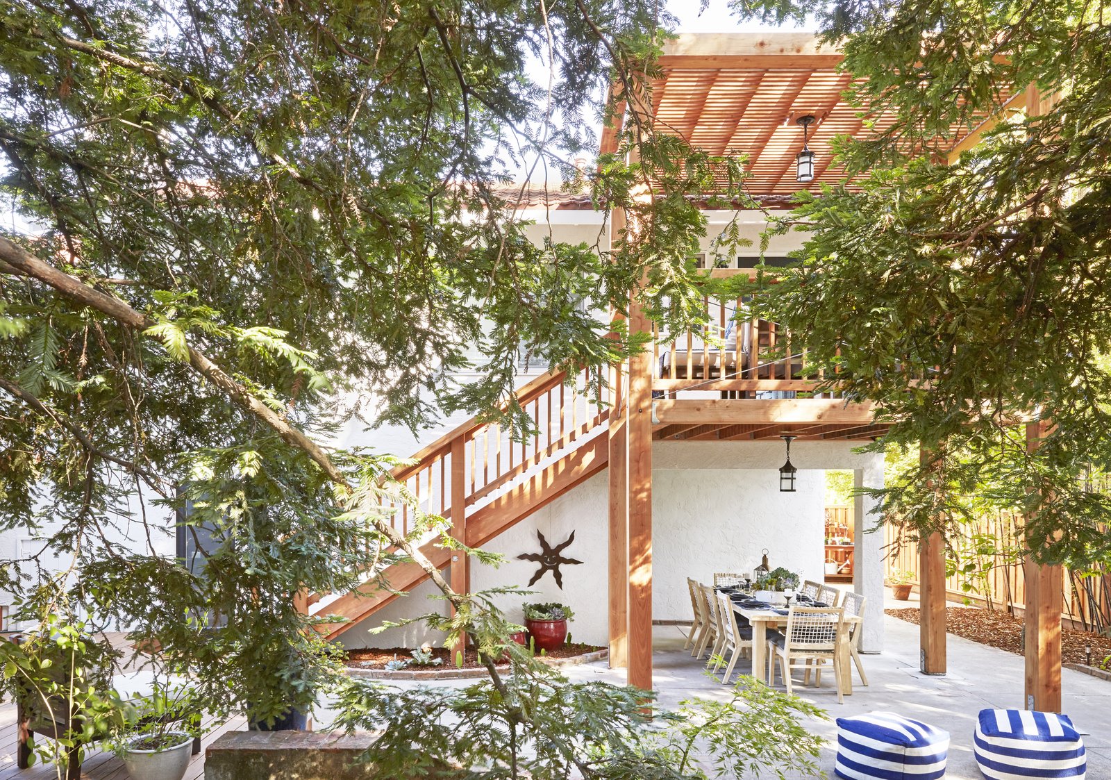 An Elegant Redwood Deck Transforms the Exterior of a ‘70s Home