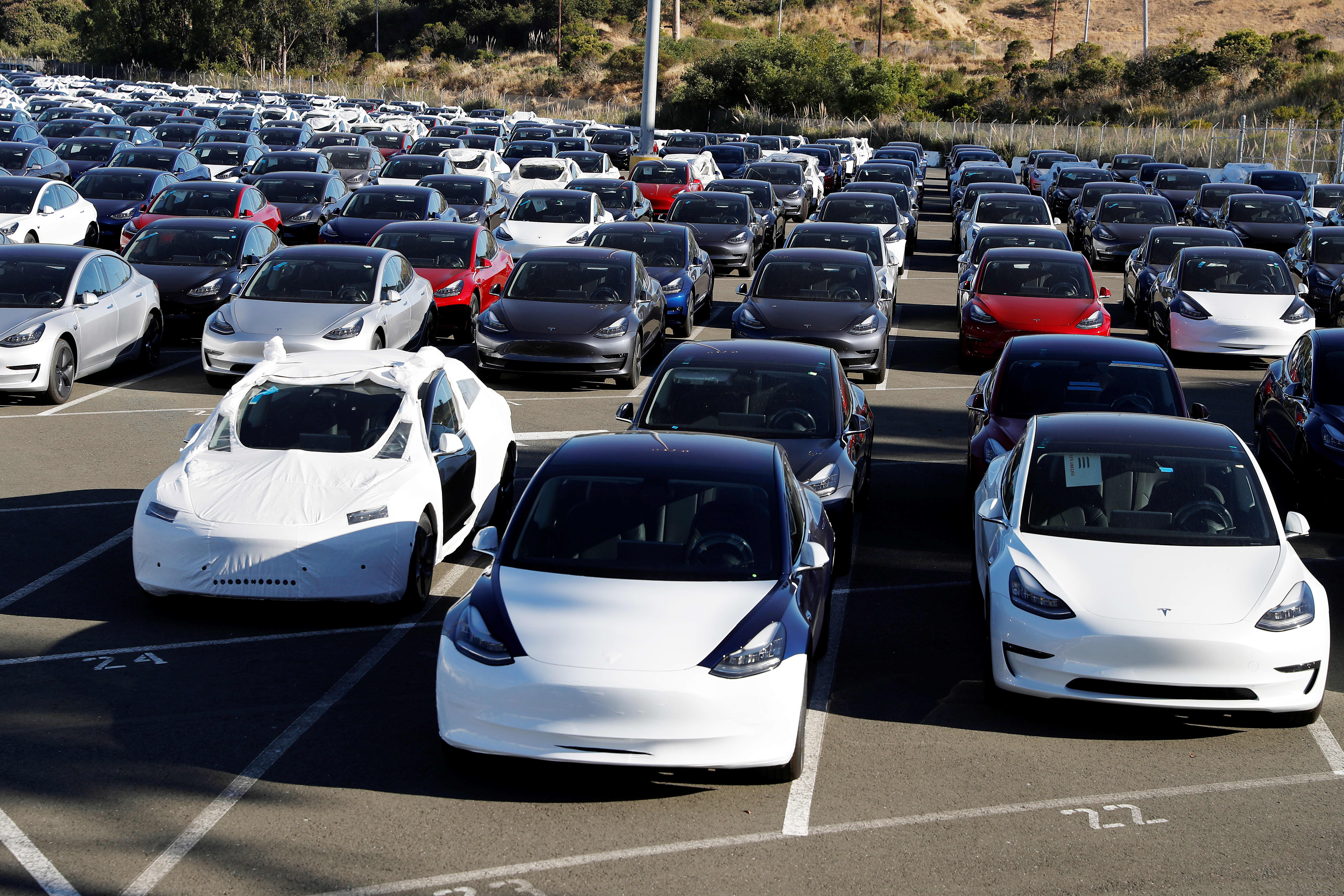 Tesla delivered 241,300 vehicles in the third quarter, topping expectations