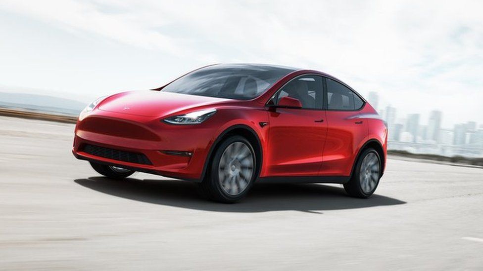 Elon Musk's Tesla reports record sales and profits
