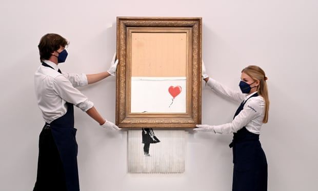 Banksy sets auction record with £18.5m sale of shredded painting