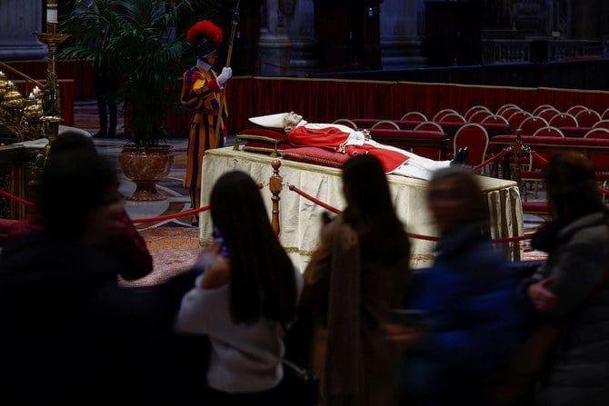 Thousands pay tribute to former Pope Benedict at lying-in-state