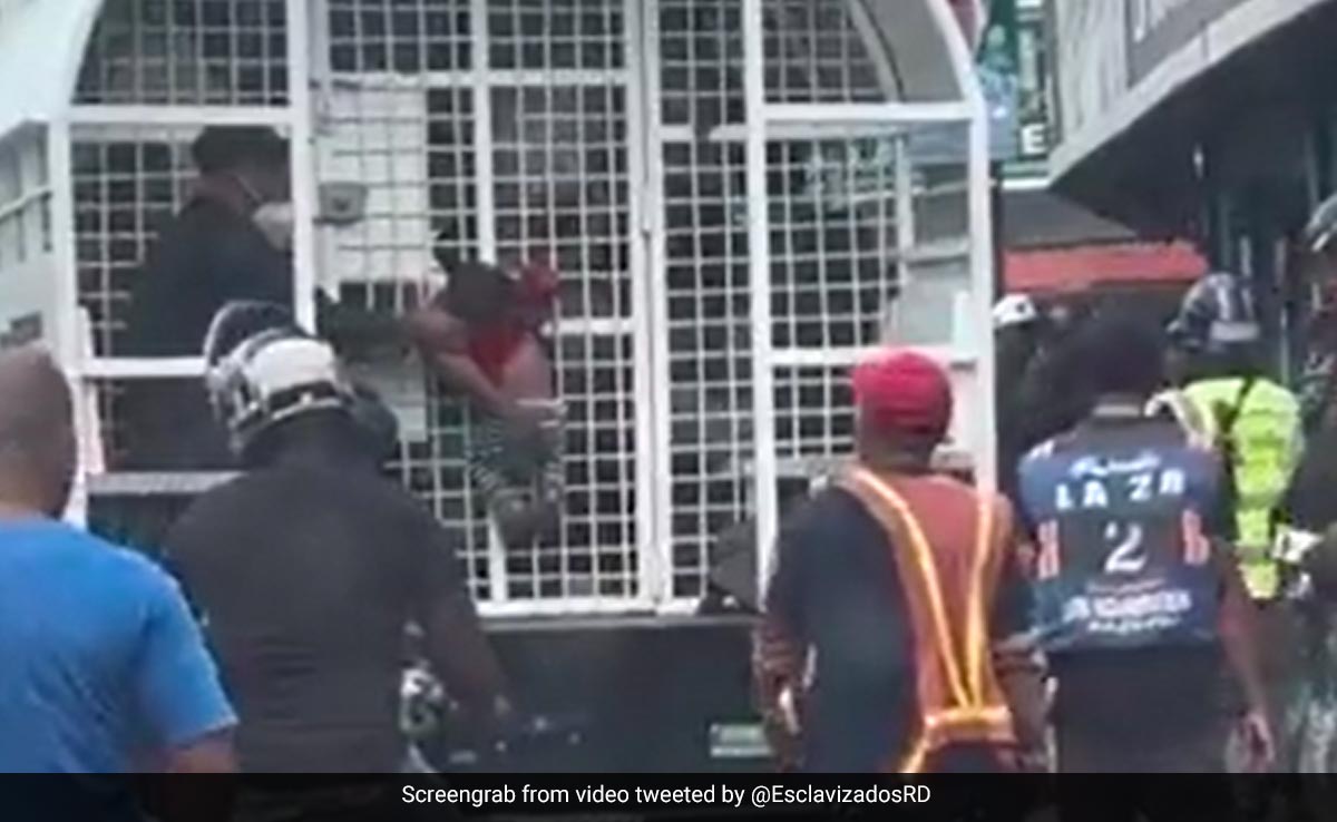 Shocking Video Shows Child Hanging from Back of Immigration Control Truck in Dominican Republic